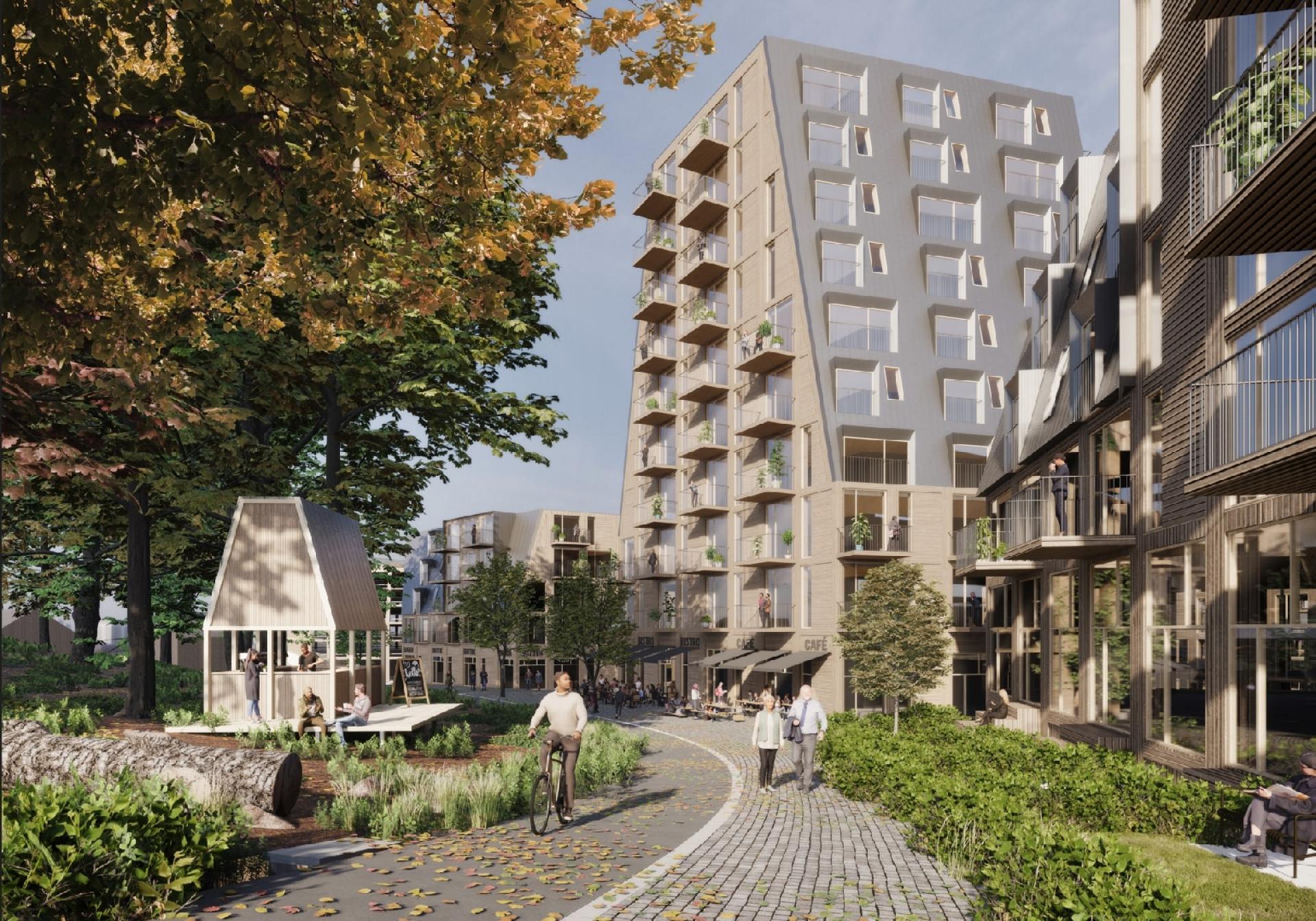 På Skanderborgvej 275 i Aarhus-bydelen Viby J skal blandede boliger med adgang til skovbørnehave, udendørs fitness, padeltennis, tarzanbane og kælkebakke samt fælleshus og aktiviteter for seniorer. Visualisering: Cebra.