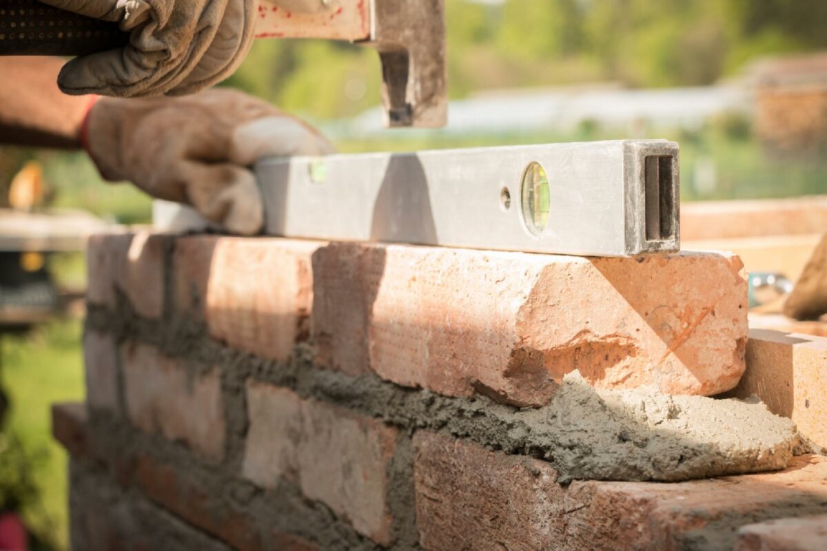 Man laying bricks