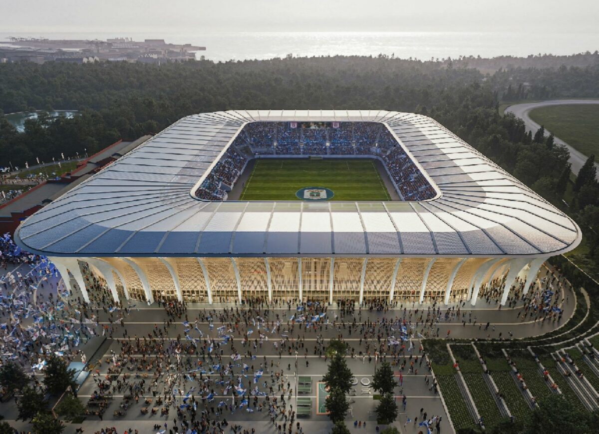 Det nye stadion i Aarhus, hvor AGF får hjemmebane, får plads til op til 22.000 siddende tilskuere og op til 24.000 tilskuere i alt. Første kamp forventes at blive spillet i midten af 2026. Visualisering: Zaha Hadid Architects