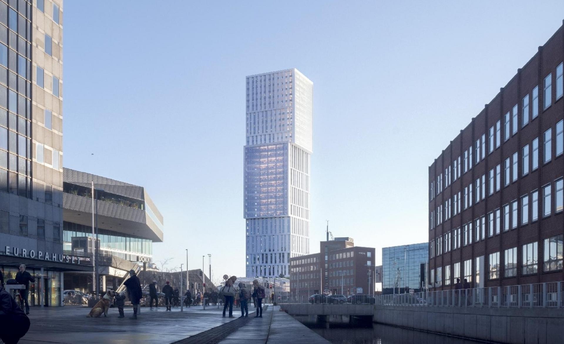 Erhvervsdomicilet Mindet på Aarhus Havn, der kommer til at bestå af både nybygget højhus og ditto p-hus, forventes at stå færdigt i marts 2027. Visualisering: C.F. Møller Architects