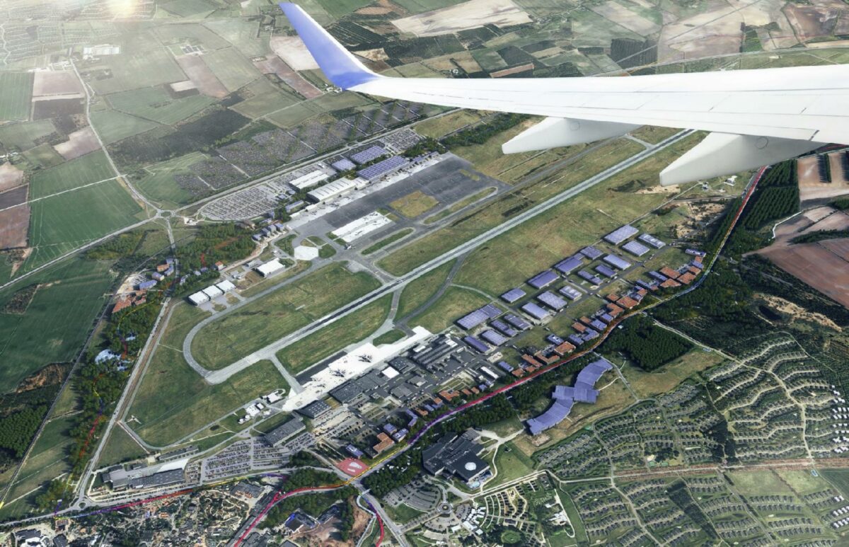 Ill. af fremtidens lufthavn i 2040: Røde og blå bygninger er illustrationer, og ingen bygninger er fastlagt.