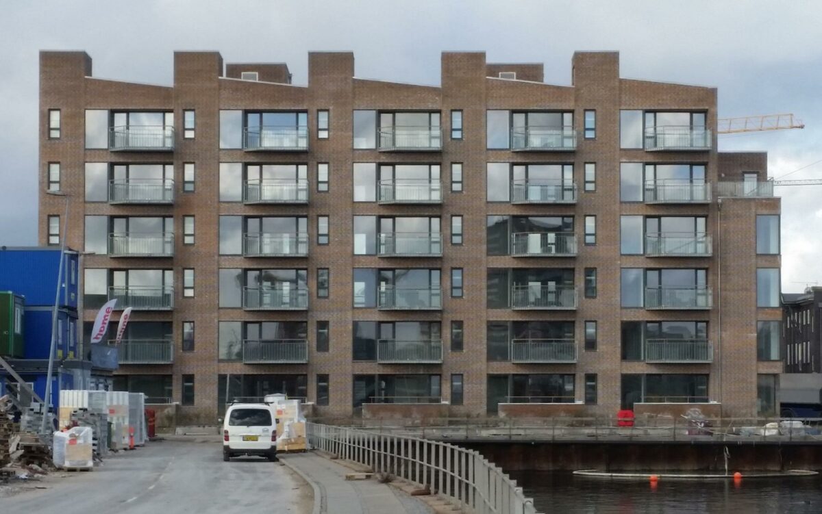 De nye lejligheder ved Sandkaj 1.03 i Nordhavn får facade ud til havnebassinet. Foto: NRE Denmark A/S.