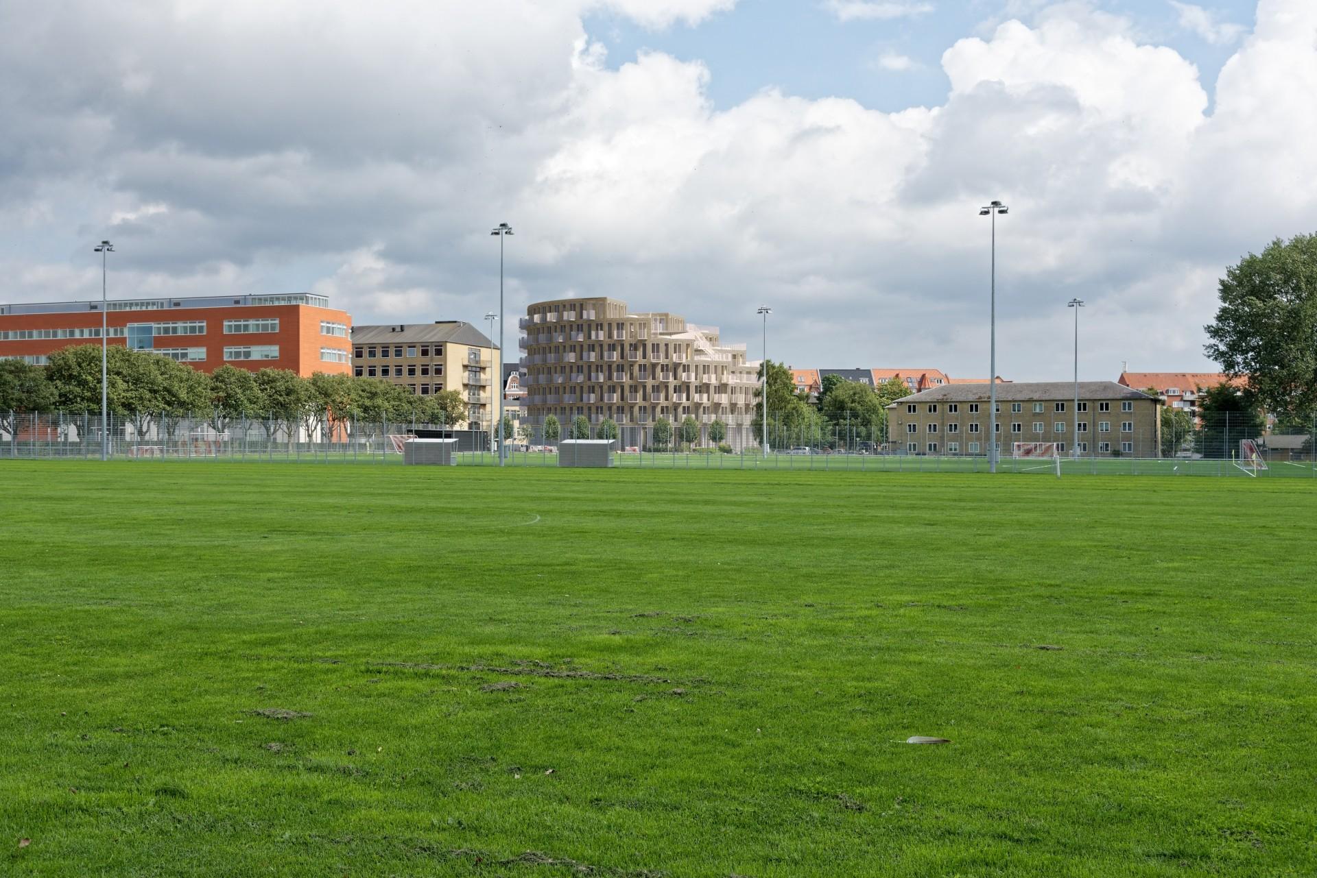 Byggeriet set fra ASA's boldbaner. Visualisering: NIRAS og Gjøde & Partnere Arkitekter.
