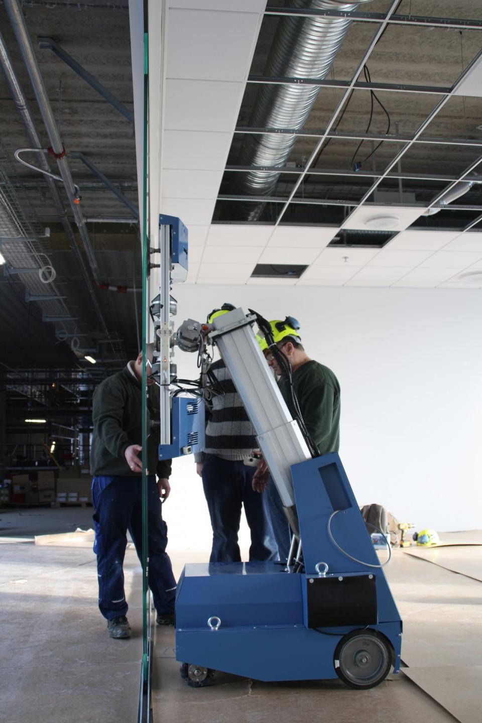 Robotter i byggebranchen kan fjerne en del af den fysiske belastning, som håndværkerne ellers udsættes for. Foto: WallMo A/S.