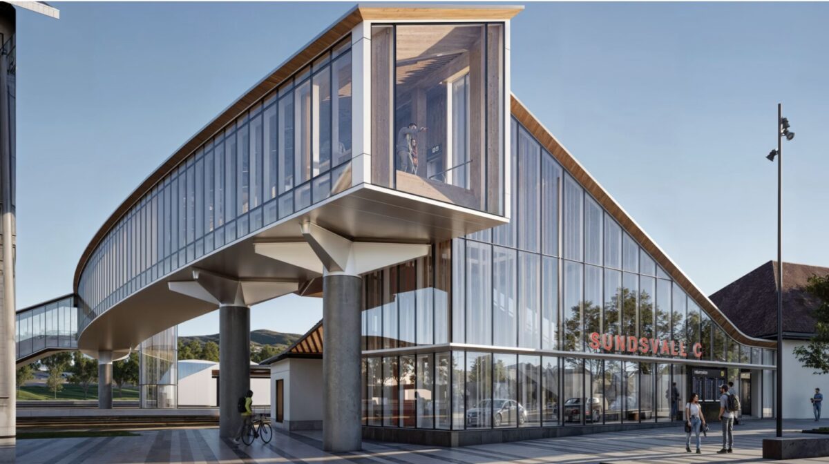 Visualisering af station med store glasfacader. Over stationsbygningen 'hænger' en bro med glas på siderne.