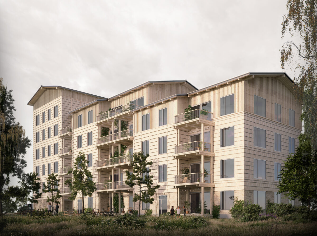 Bygning med træer i forgrunden