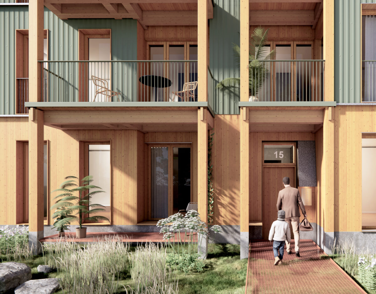 Mand og barn på vej ind i bygning